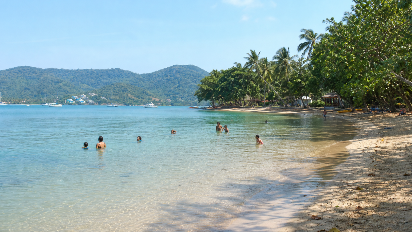 Calm shallow water and relaxed swimming at Ao Yon Beach Phuket