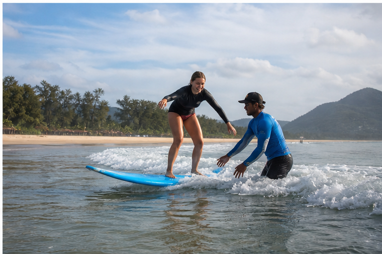 A beginner surf lesson on a small wave at Bang Tao Beach in Phuket