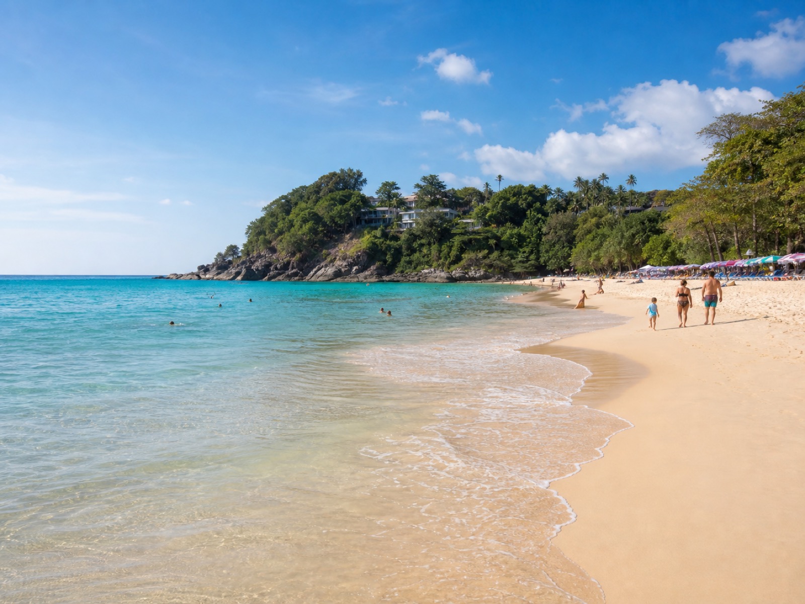 Kata Beach with clear morning water, soft sand, and a relaxed family-friendly shoreline