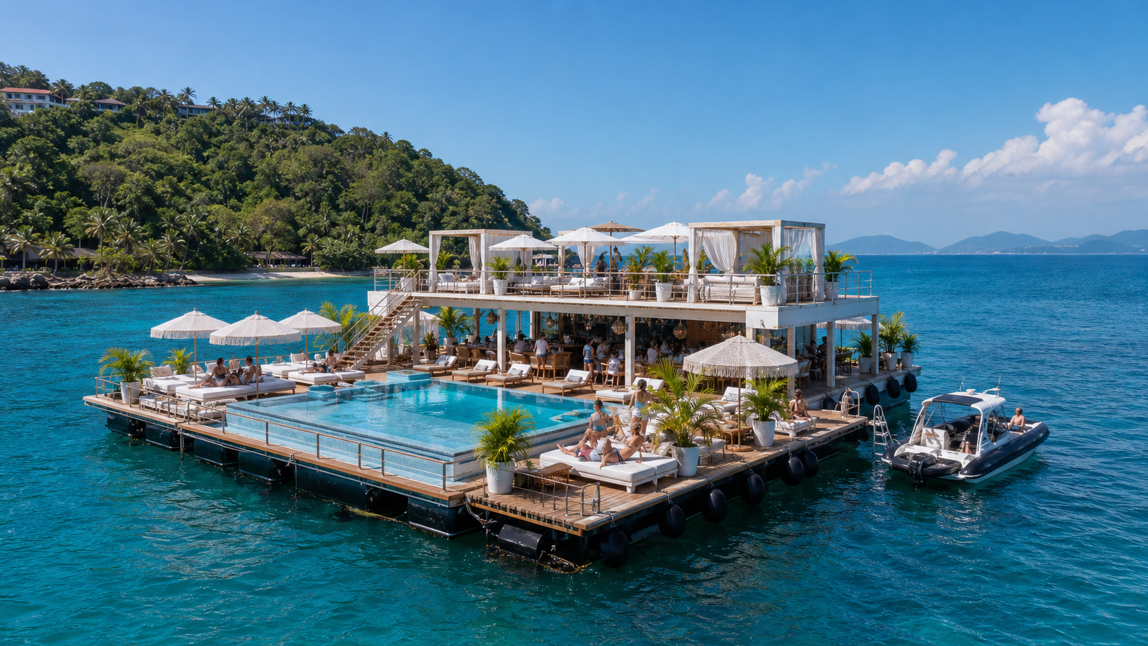 Stylish Phuket beach club at golden hour with loungers and the Andaman Sea